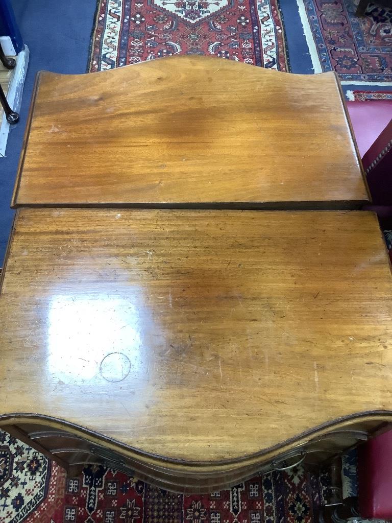Two George III design mahogany serpentine chests, each fitted brushing slide and three drawers (one 19th century or later), width 77cm depth 49cm height 76cm